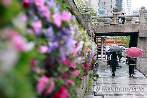 대부분 지역 오후까지 비…때이른 초여름 더위도 주춤