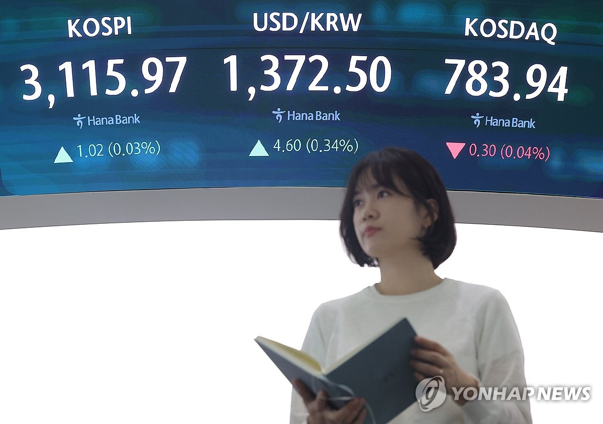 Seoul shares up 0.34 pct late Wed. morning despite Trump's tariff threats