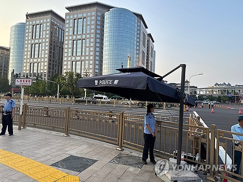 김정은車 움직이자 베이징 핵심대로 '텅'…중국이 높여준 北위상